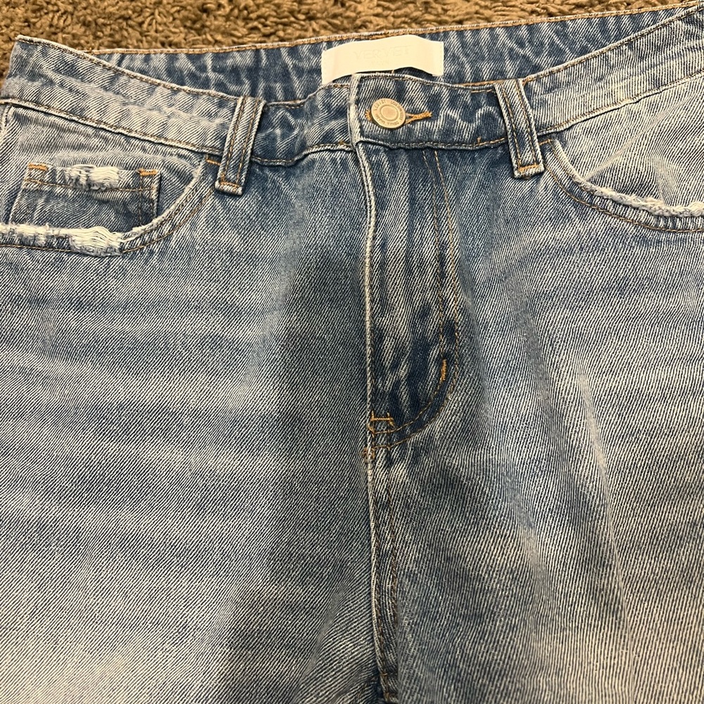 Distressed cropped jeans - Picture 4 of 11